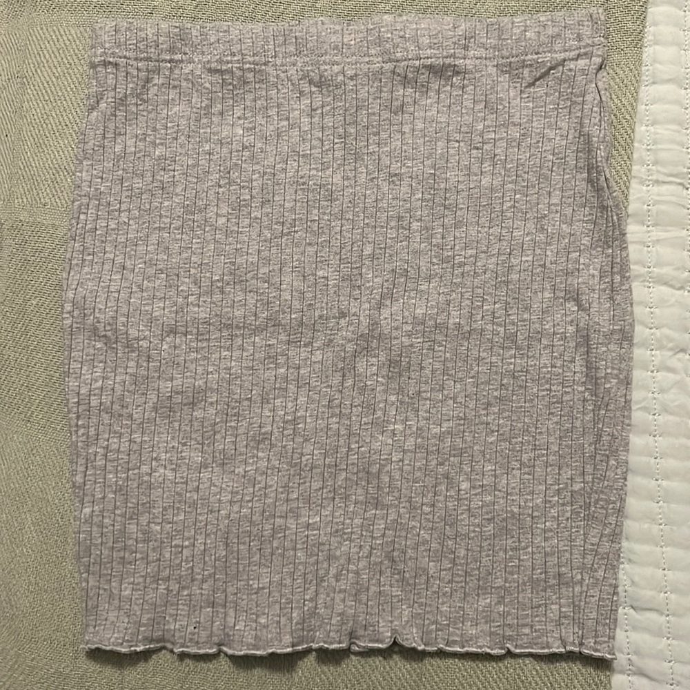 Gray skirt.